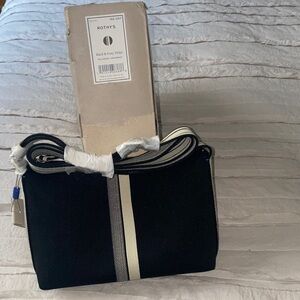 Rothy's Elegant Black and Cream Crossbody Bag